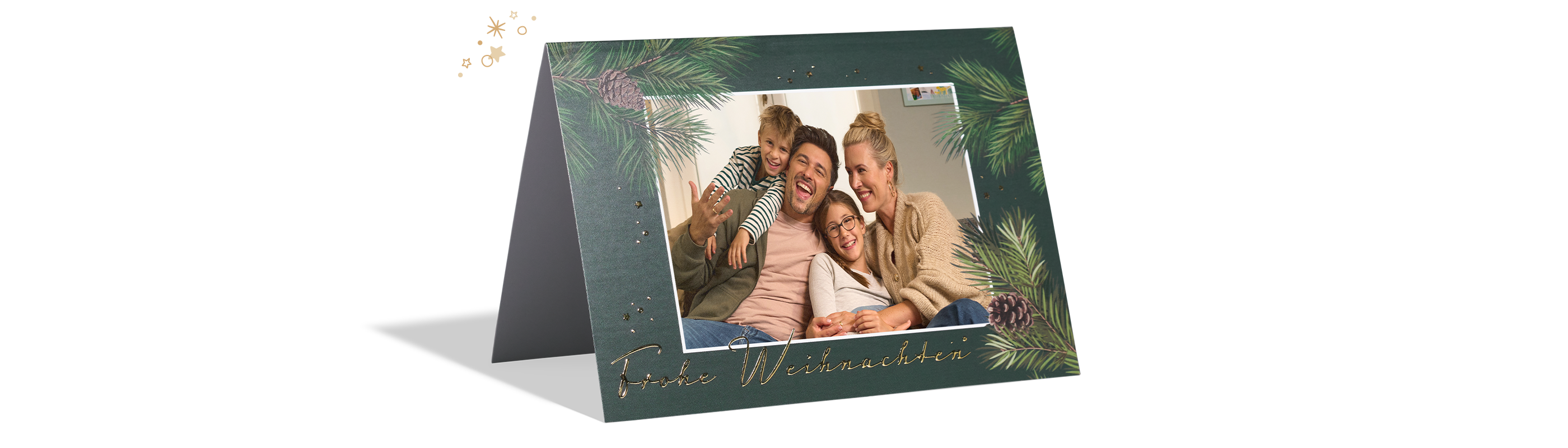 CEWE Weihnachtskarte mit Familienfoto, Tannenzweigen und goldener Aufschrift „Frohe Weihnachten“
